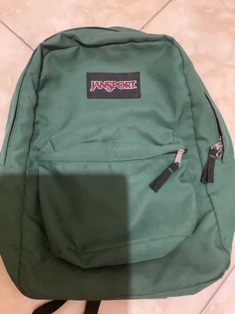 dark green jansport backpack