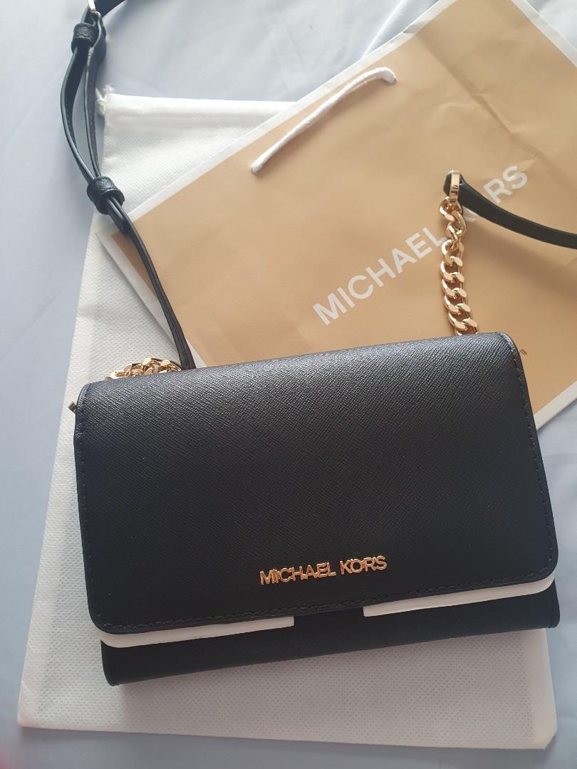 Authentic Michael Kors Jet Set Travel Medium Saffiano Leather Crossbody bag,  Luxury, Bags & Wallets on Carousell